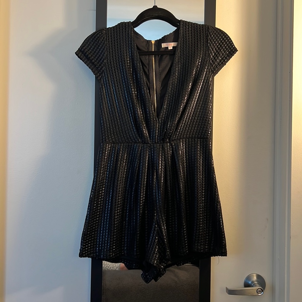Shiny Black Romper size small worn once